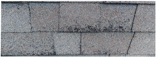 Asphalt roofing shingles with missing granules